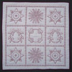 Custom Amish Quilts - Hand Embroidered Red Snowflake Small Quilt Wall Hanging 
