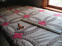 Amish Quilt in rack AmishQuilter Quilt in Rack